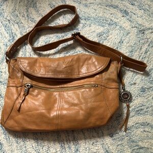 The Sak soft camel color, leather Crossbody fold over purse.